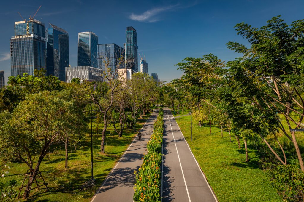 Benchakitti Park cycling path Bangkok skyline - slow travel Thailand