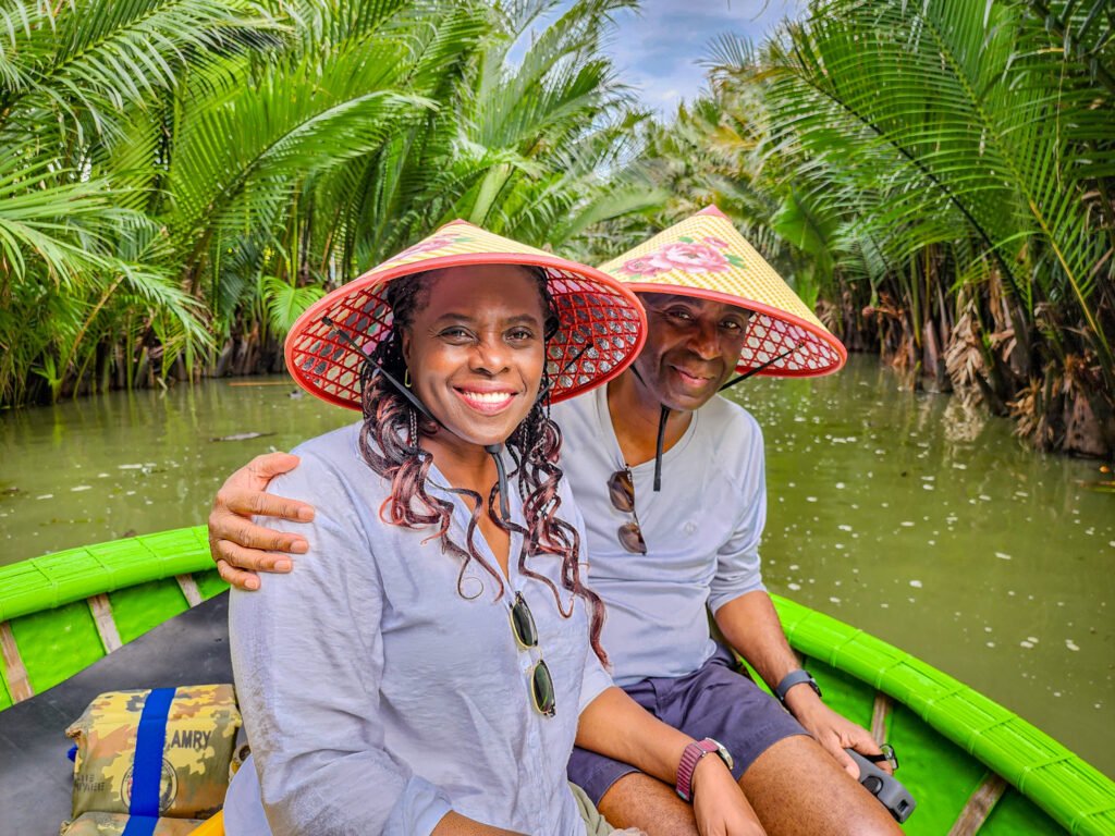 Mike and Marge Lowe on a basket boat ride through the Water Coconut Forest — Hoi An Vietnam slow travel