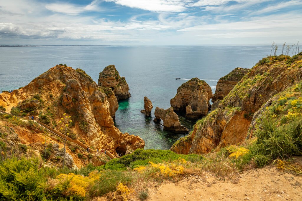 Ponta da Piedade coastal walk during slow travel Algarve Portugal