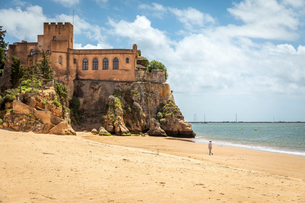 Forte de São João do Arade overlooking Praia da Angrinha beach in Ferragudo Algarve Portugal